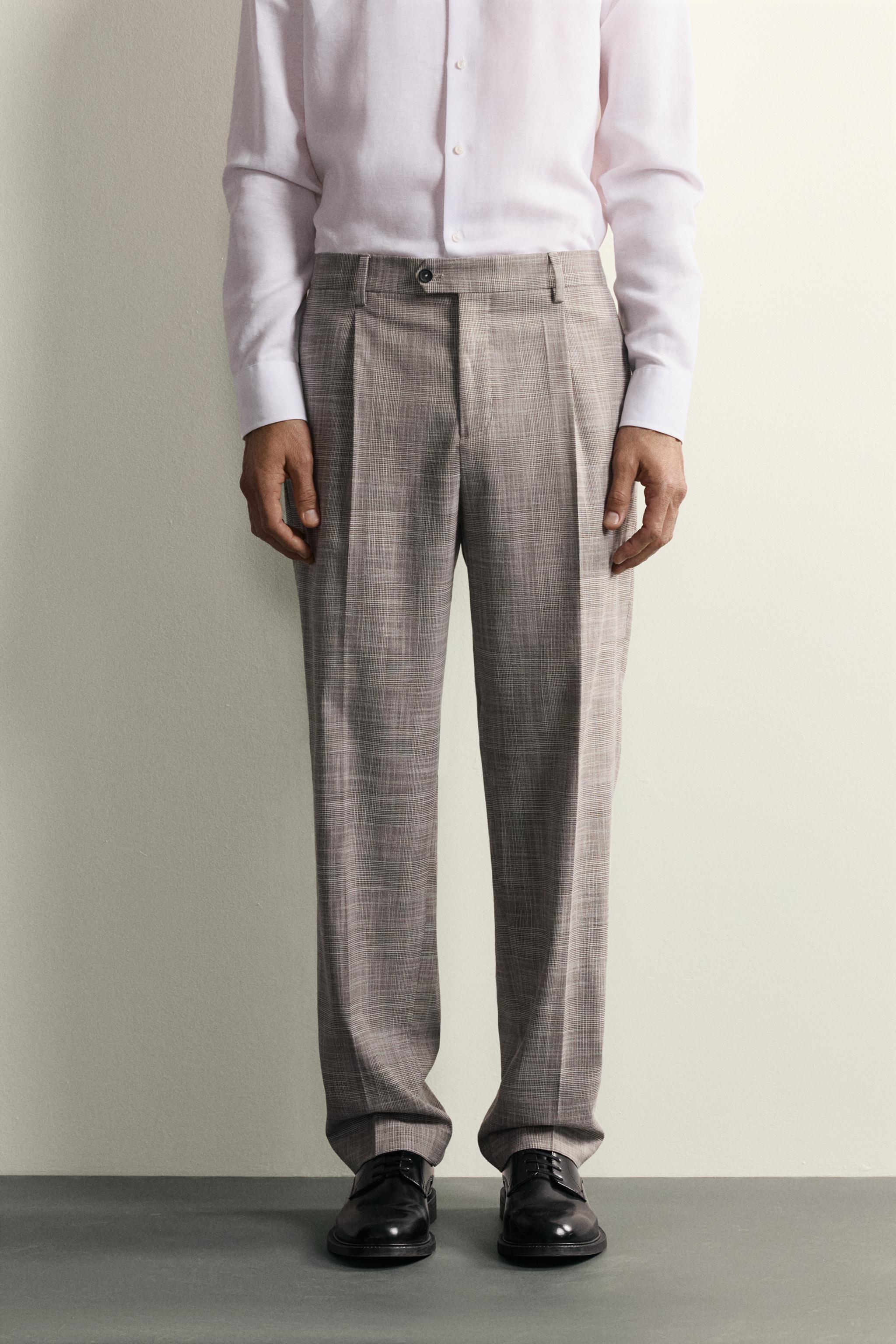 PANTALON DE COSTUME À CARREAUX ET PLIS EN LAINE
